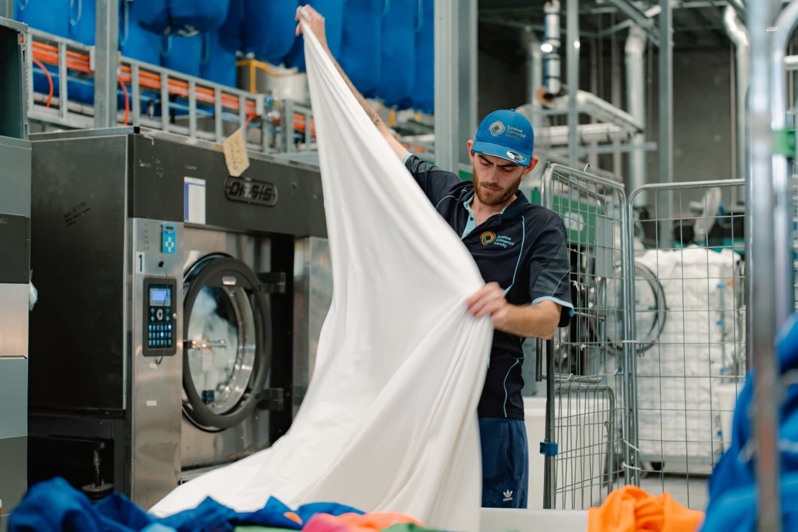 Team members working on high-quality linen processing